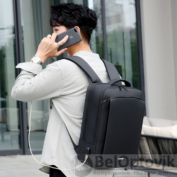 Городской рюкзак для ноутбука до 15,6" с креплением для чемодана и отделением для наплечных ремней, черный