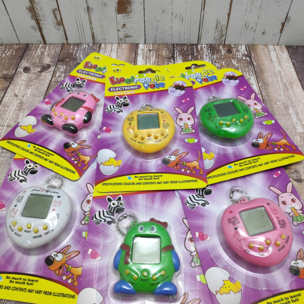 Тамагочи, 6 питомцев и 168 игр в одном Зеленый