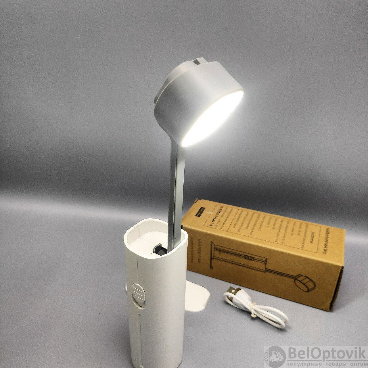 Универсальная портативная лампа Roссi  модель D16 (лампа, фонарик, powerbank 2600 mAh, 3 режима свеч