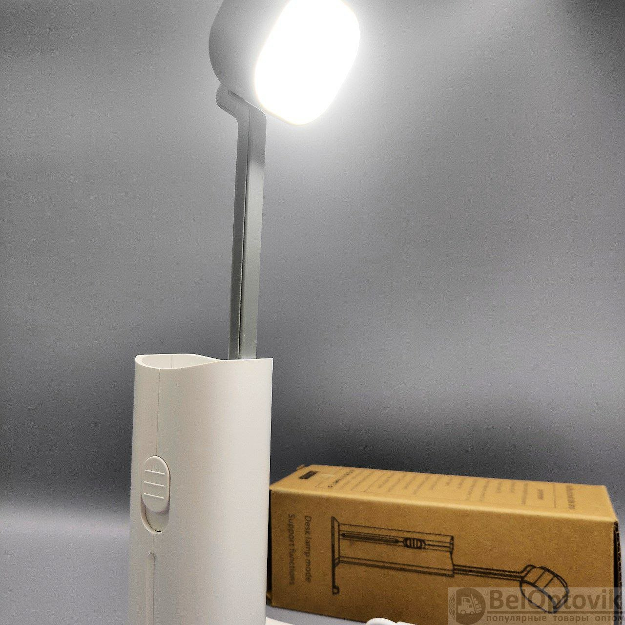 Универсальная портативная лампа Roссi  модель D16 (лампа, фонарик, powerbank 2600 mAh, 3 режима свеч